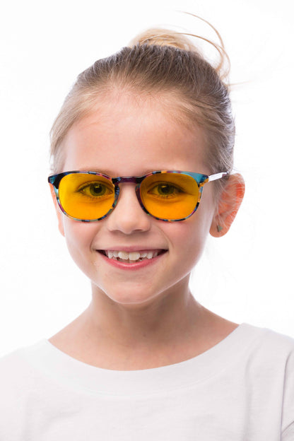 Girl Wearing Elsa Light Sensitivity Glasses Readers